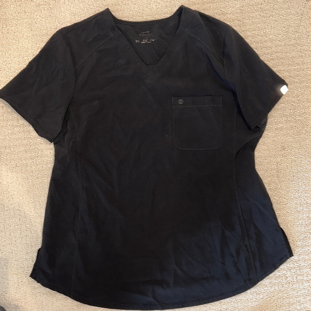 I am selling a set of Infiniti Scrubs that are black and the size is medium